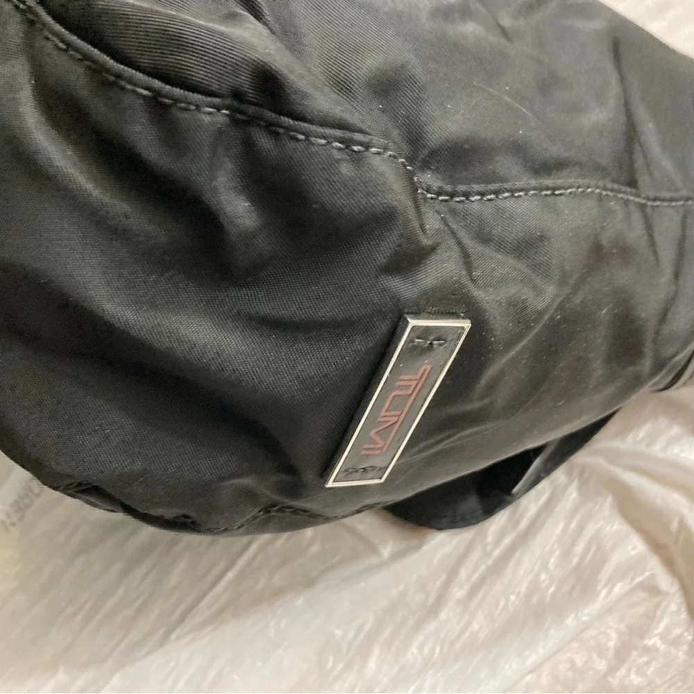 Tumi black nylon camera crossbody bag unisex